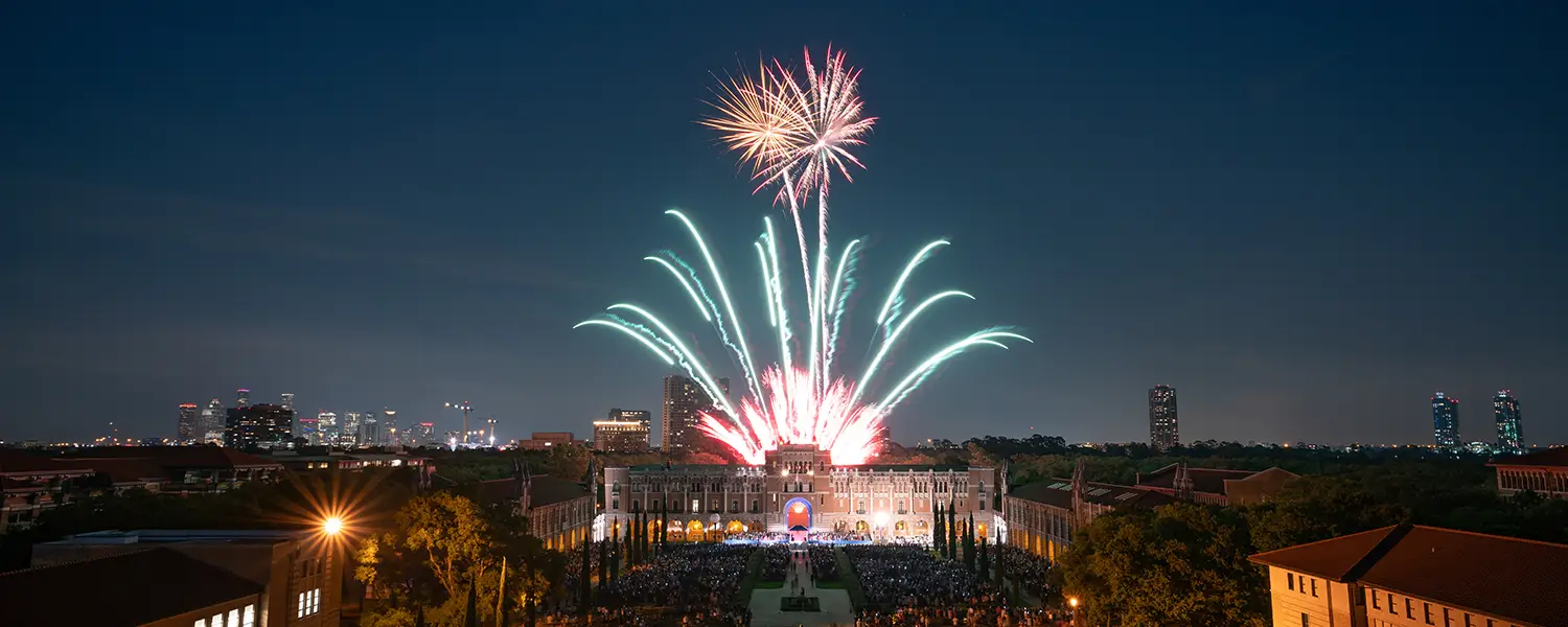 Fireworks at dark over Lovett Hall