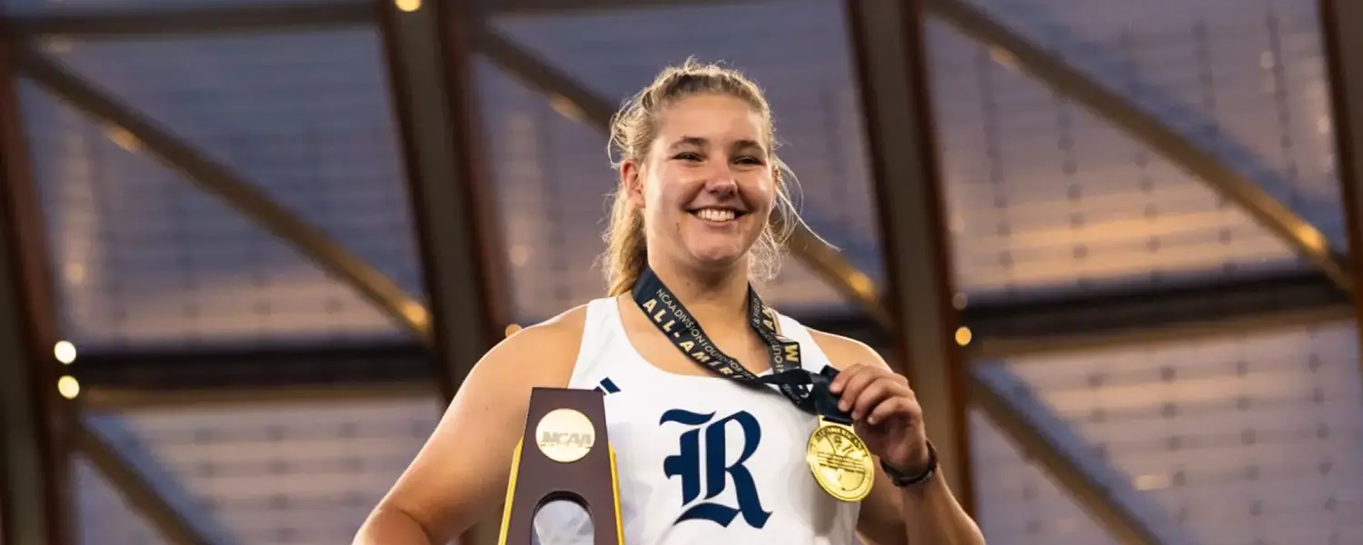 Mckyla Van der Westhuizen holds trophy and medal being crowned National Champion in the javelin at the 2026 NCAA Outdoor Championships in Eugene, Oregon